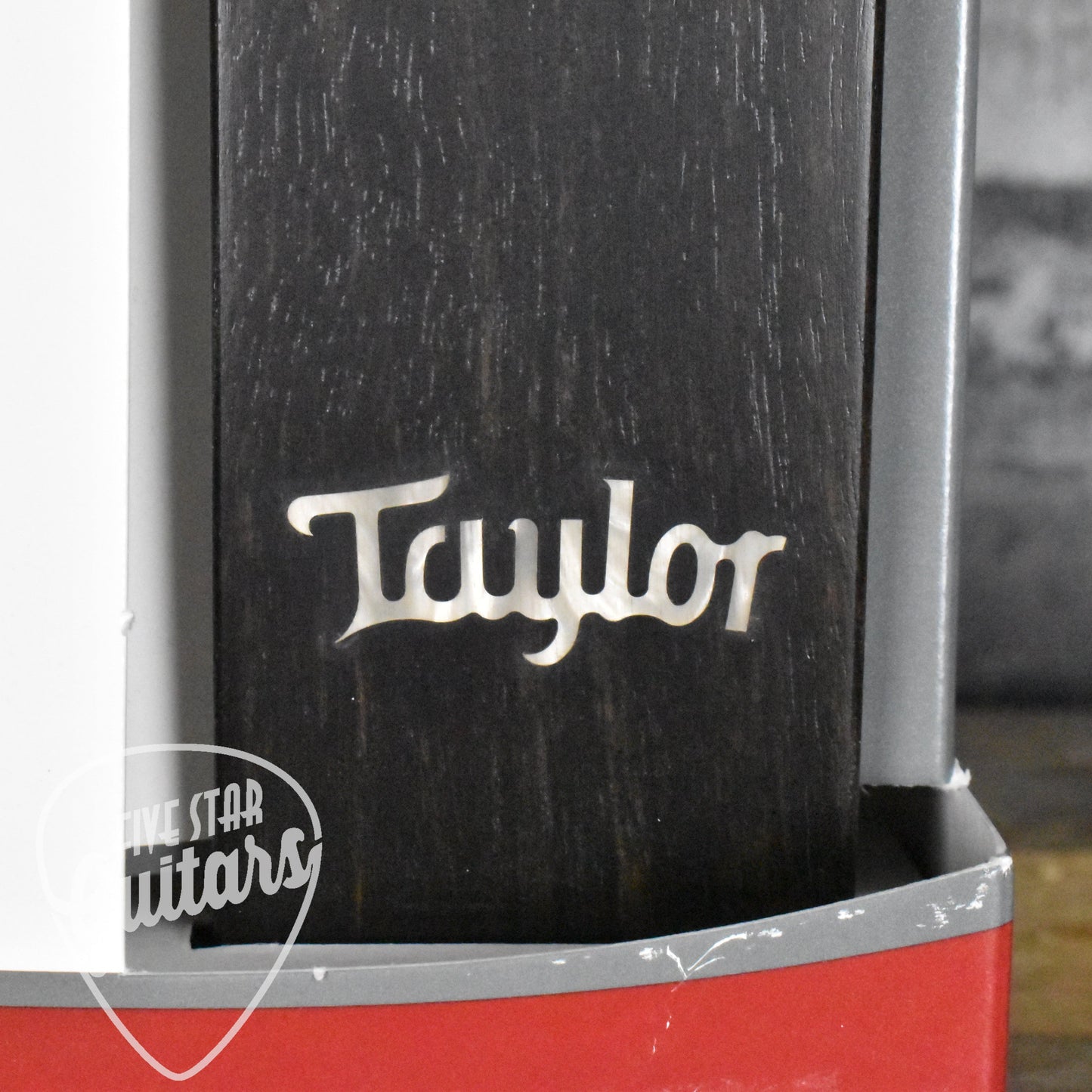 Taylor Ebony Guitar Hanger Taylor inlay