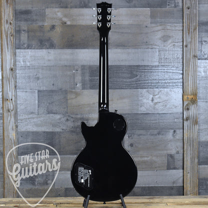 Pre-Owned Gibson Les Paul Traditional Pro V - Transparent Ebony Burst with Hardshell Case
